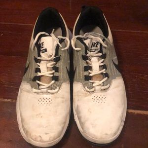 Nike white mens size 10.5 golf shoes. Worn details in photos. Still wearable